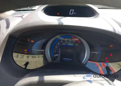 2011 Honda Insight z USA, uszkodzony, nr VIN JHMZE2H33BS003340